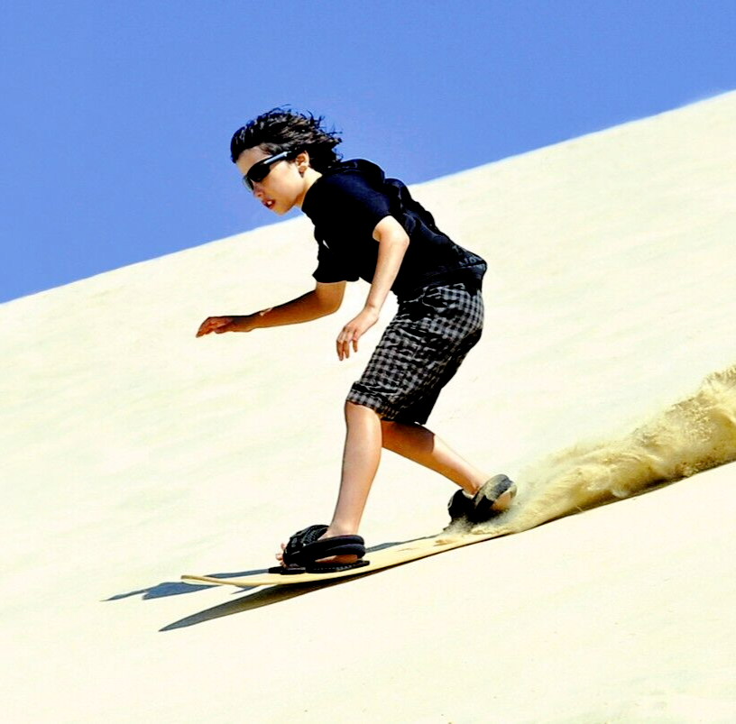 The 7 Best Sandboarding Hot Spots in the World, From Australia to Peru