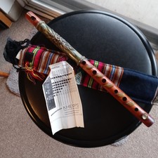 Carved bamboo flute w/ Green Man