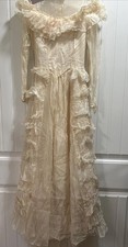 antique vintage tulle lace wedding gown with ruffles and a train ivory handmade