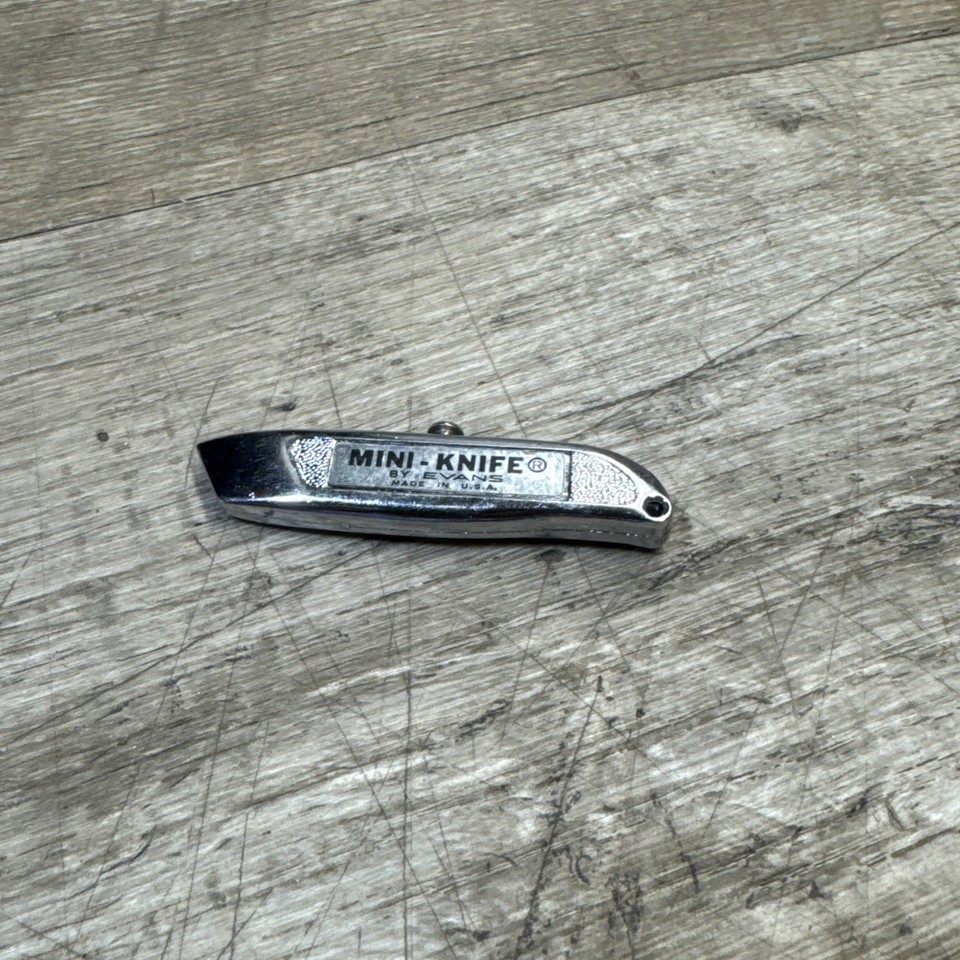 A USA-made Evans Precision mini box cutter keychain promo knife — a perfectly pocketable piece of mid-century American industrial promo culture.