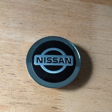 Nuovo Originale Nissan Qashqai Lega 65mm Tappo Centrale Ruota Nero Cromato 1 404326HL6A