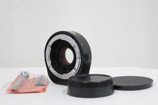 Nikon AF TELECONVERTER TC-16A 1.6X with front and rear caps, teleconverter