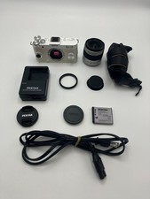 Fotocamera mirrorless Pentax Q-S1 obiettivo 5-15 mm f2.8-4.5 bianco