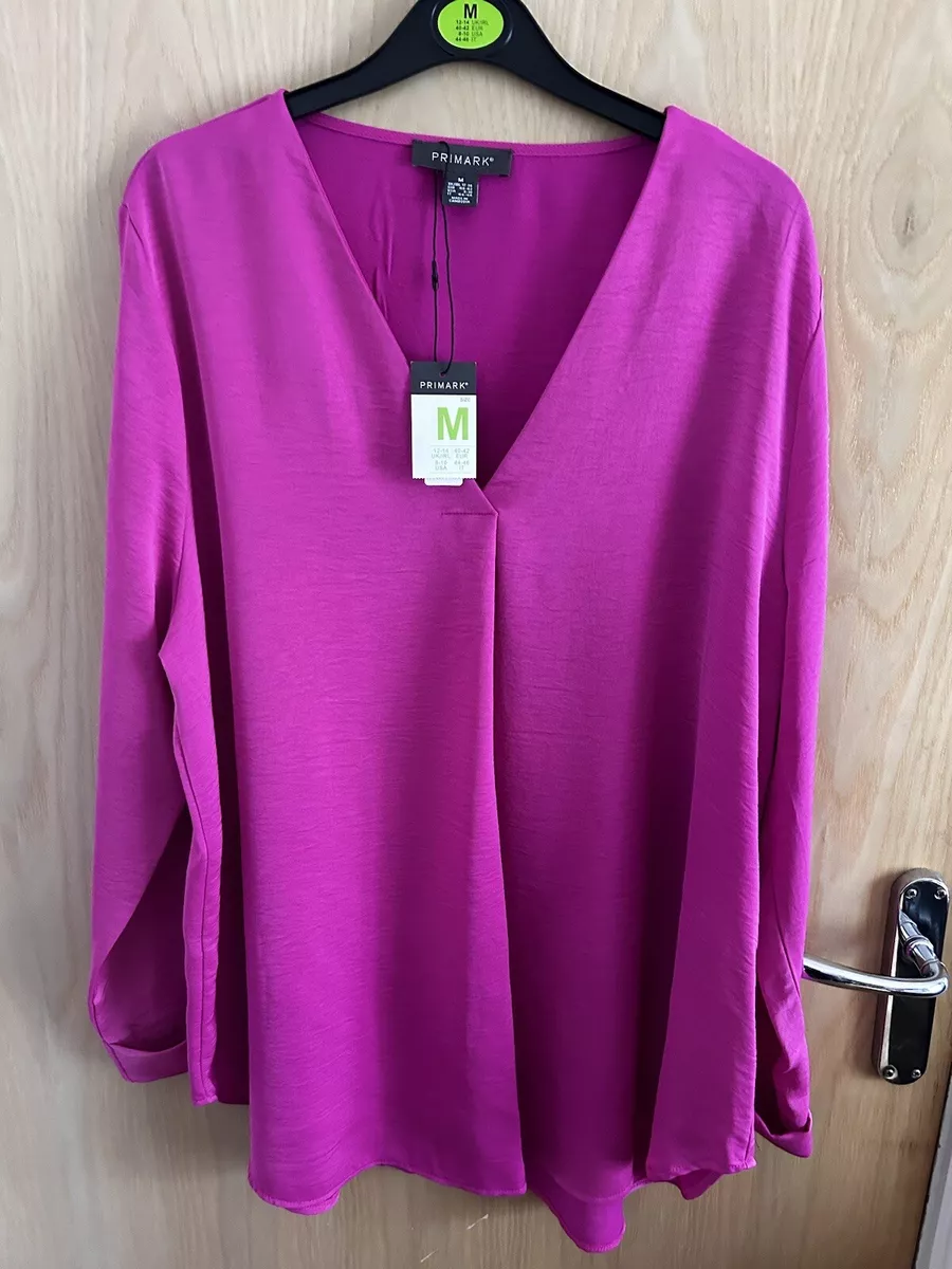 pink v neck long sleeve top