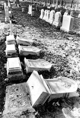 Vandalized grave markers are pictured Mount Hope cemetery Bos- Boston Old Photo
