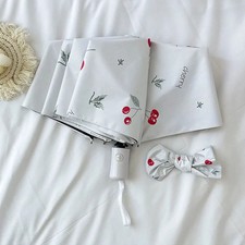 Double layered windproof umbrella with cherry pattern, compact and portable, sun