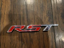 GM OEM 2019-2024 Chevrolet Silverado RST Chrome and Red Emblem 84319995 Used