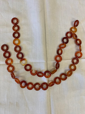 2, 15 in. strand Carnelian Donut Beads, 18mm diameter, one broken bead