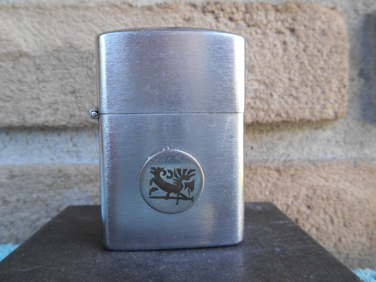 VINTAGE BEST-EVER FLIP TOP CHROME CIGARETTE LIGHTER WITH ODD TOKEN COIN  EMBLEM