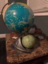 This is a mid-century Japanese Earth and Moon globe by Mahina, circa 1970s