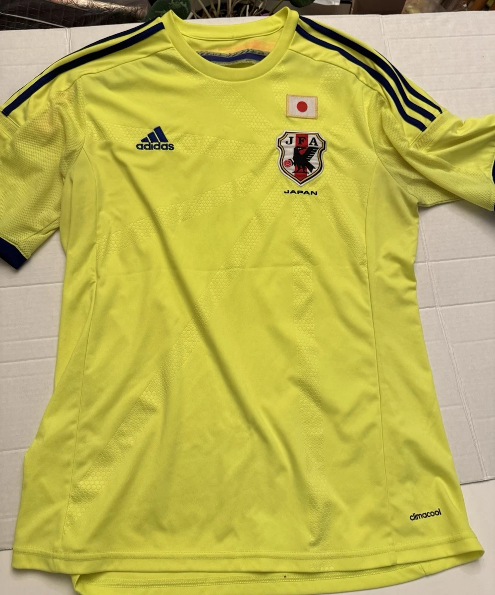 Preços baixos em Japão Amarelo National Team Roupas e Souvenirs
