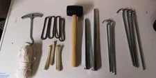 Complete tent kit, pegs, guy lines, rope, peg remover, rubber mallet *new*