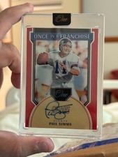 2024 Panini One - Once in a Franchise Autographs Phil Simms  Red /60