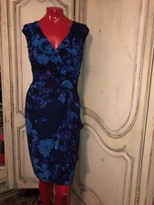 woman’s figure flattering dress designed by Chaps size SP