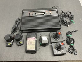 ATARI 2600 Vader 4 Switch System  37  Games and Manuals    Tested   Working