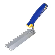 1/4 In. X 1/4 In. X 1/4 In. Comfort Grip Square-Notch Margin Flooring Trowel wit