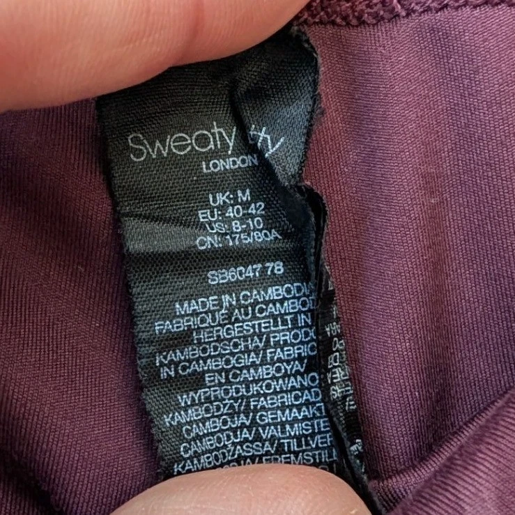 Leggings deportivos Sweaty Betty todo el día púrpura floral EE. UU. 8/10 longitud talla M Foto 3 de 4