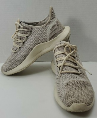 cream colored adidas shoes