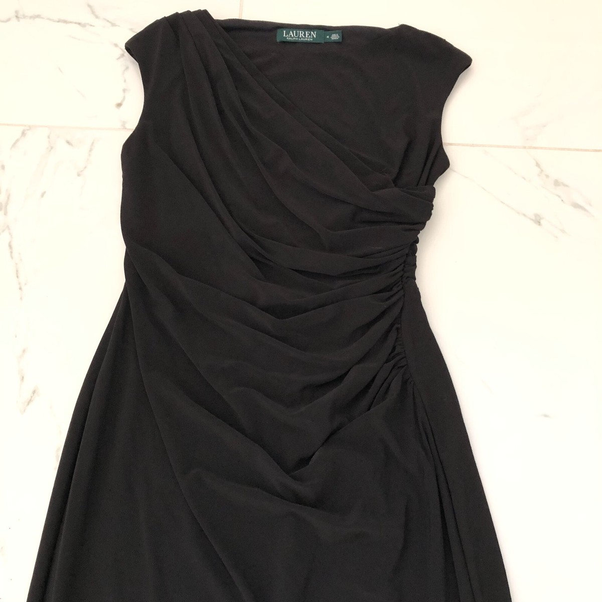 ralph lauren black dress Women's Dresses & Jumpsuits which features a sheath silhouette intricately decorated with glistening sequins and cascading georgette ruffles on the skirt. Ralph Lauren Women's Wool Crepe