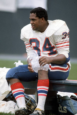 Jim Braxton Buffalo Bills ices his knee while sitting on the benc- 1974 Photo