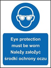 multilingual signs eye protection must be worn English and polish Safety sign 
