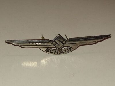 Emblem ''Schaub'' aus Schaub Weltsuper 40GW (WS40GW) Allstromgerät - Röhrenradio