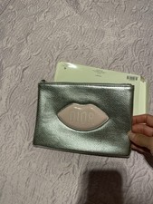 Authentic Dior Make Up Silver Bag with A Pink Lips. Never Used