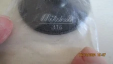 Mitchell Side Plate That fits the 314 Spinning Reels. NOS