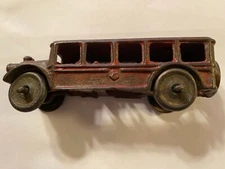 ANTIQUE A.C. WILLIAMS CAST IRON FIVE WINDOW TOUR BUS WITH METAL WHEELS - 5" LONG