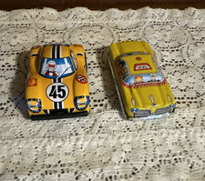 2 Vintage Tin Cars/1 is a race car with friction/1 taxi with no friction