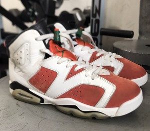 orange and white jordan 6