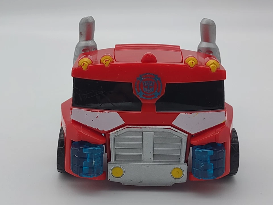 Transformers Rescue Bots Optimus Prime Energize Figure Semi Trailer Truck & Saw - Image 3 of 4