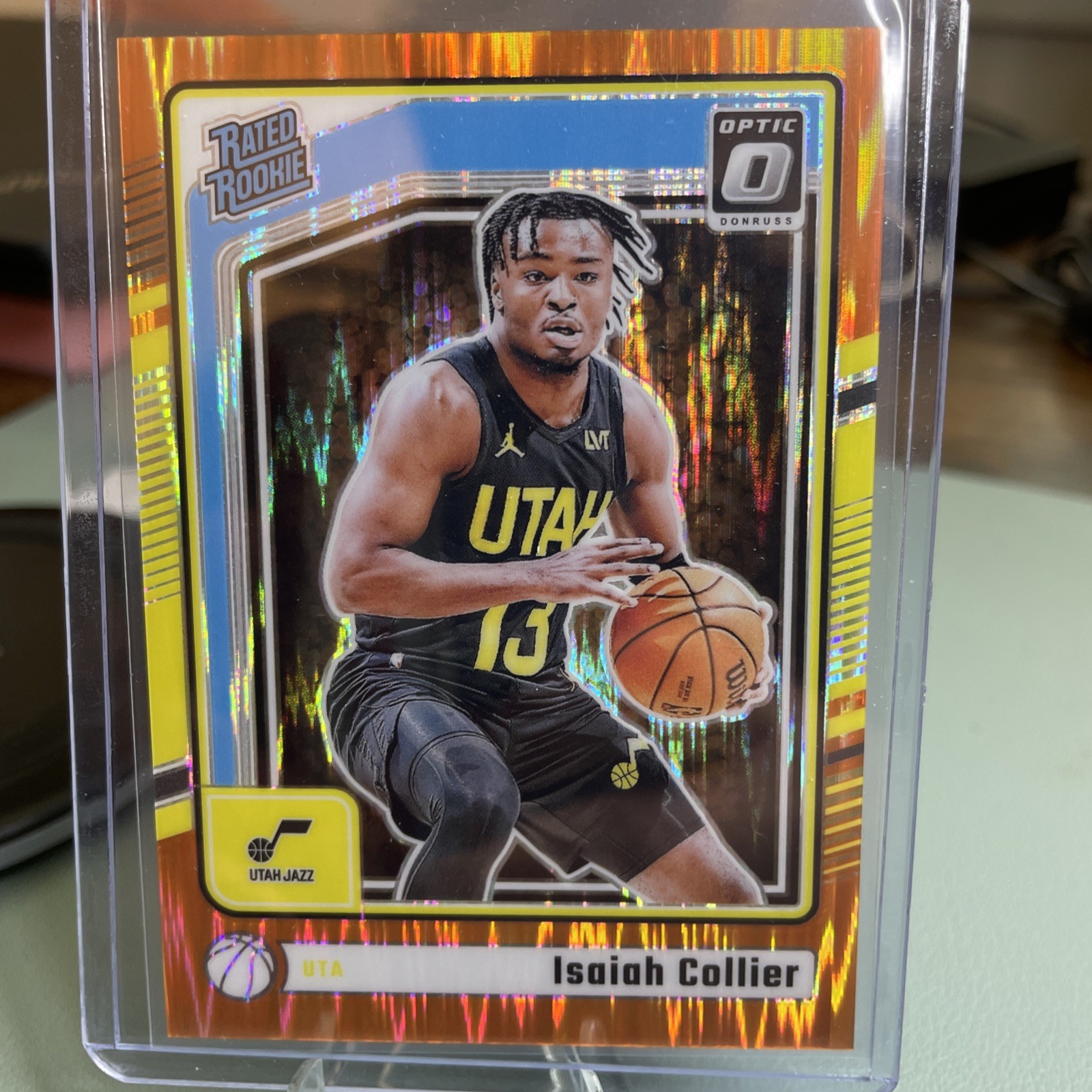 2024-25 Donruss Optic #295 Isaiah Collier Orange Shock #/225 Rated Rookie Jazz