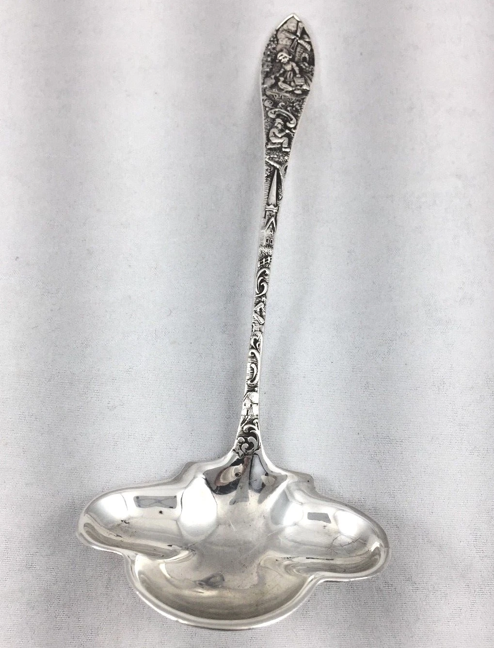Dutch Scenic Figural Sterling Sauce Ladle by Weidlich