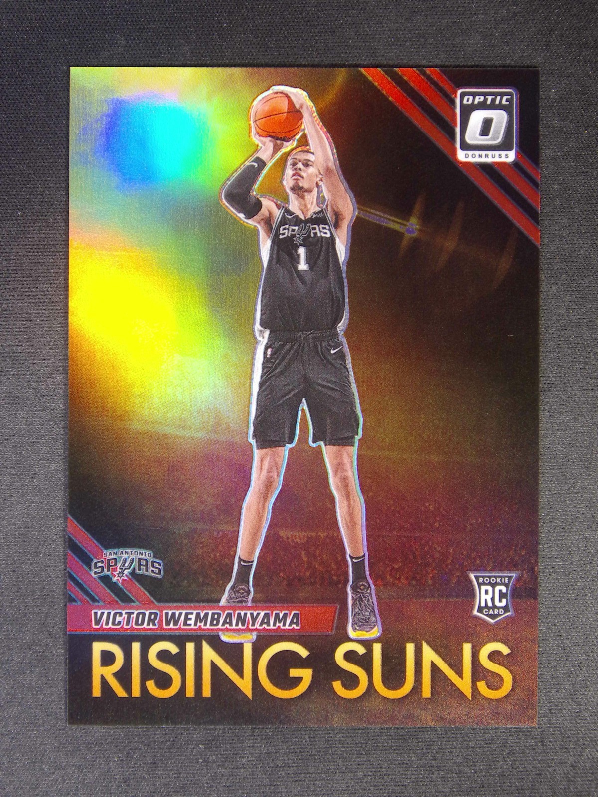 2023-24 Panini Donruss Optic Victor Wembanyama #11 RC Rookie Rising Suns Red /99
