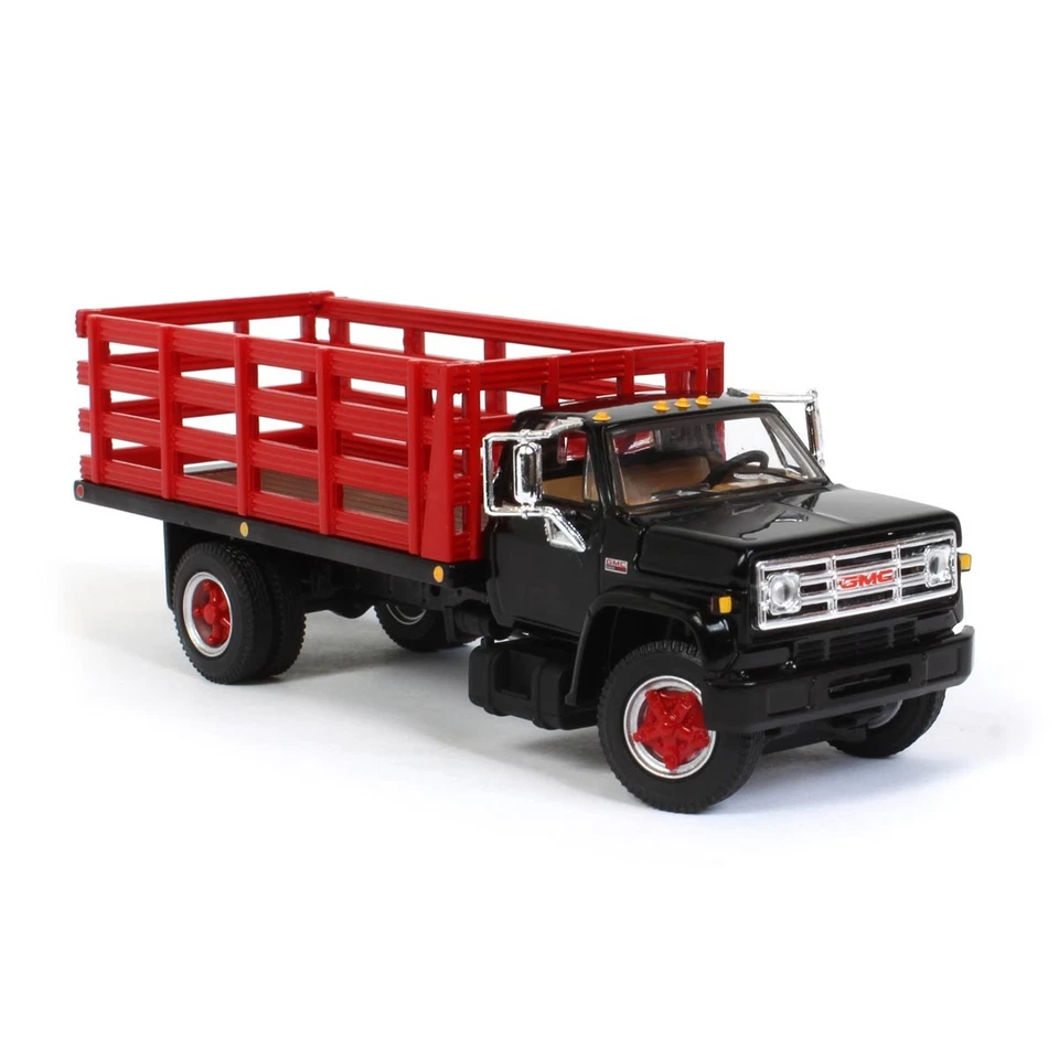 1/64 Diecast GMC 6500 Stake Bed Truck Black w/ Red Stakes First Gear DCP 60-0890 - Image 2 of 4