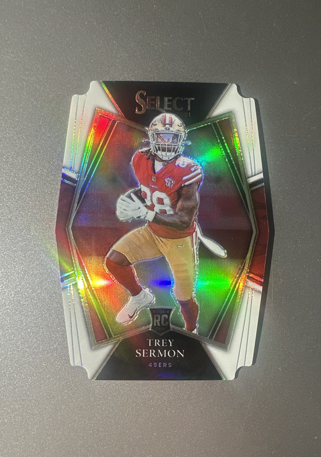 2021 Panini Select - Premier Level Trey Sermon #168 White Prizm Die-Cut /99 (RC)