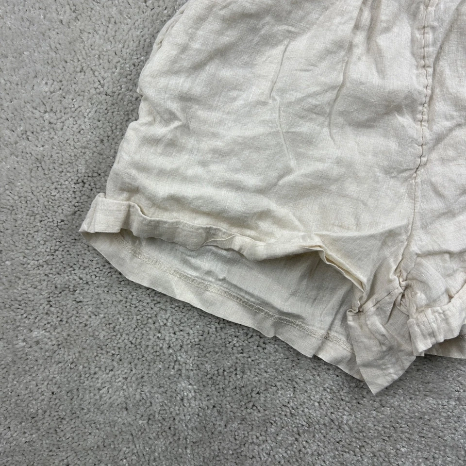 Shorts feminino H&M 100% linho tamanho pequeno bege frente plana bolsos elásticos - Imagem 2 de 4