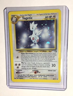 pokemon card togetic 176 Holo - Gold, Silver, to a New World Super Metronome copies that attack except for its Energy cost Togetic | XY—Roaring Skies |