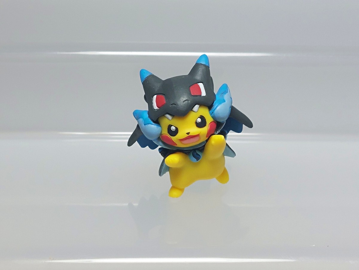 Pokemon Center Japan 2016 Poncho wearing Pikachu (Charizard X