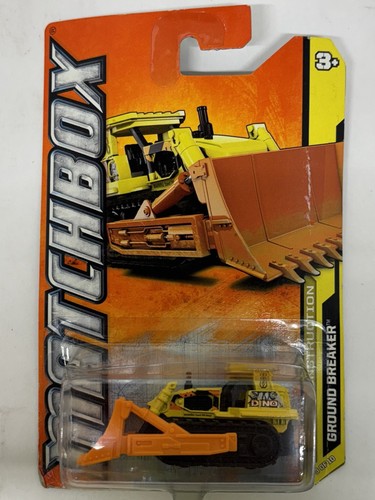 Juguete rompedor de tierra Matchbox MBX Construction 2011 amarillo y naranja - Imagen 1 de 6