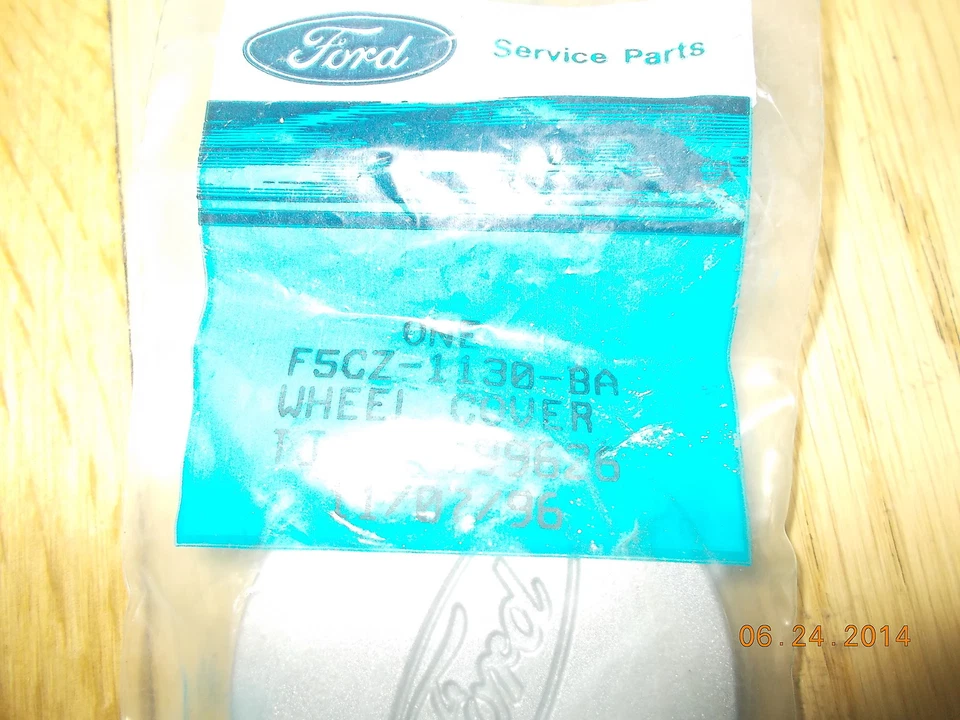 Tapa central de rueda Ford Escort 1995-2002 fabricante original F5CZ-1130-BA Foto 2 de 2