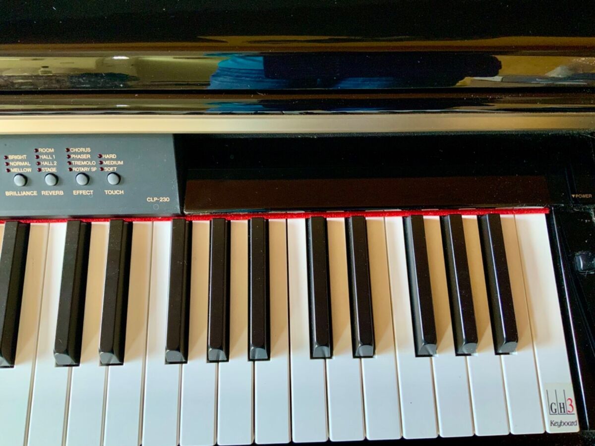 Digital piano Yamaha Clavinova CLP-230 in Ebony finish with Digital piano Yamaha Clavinova CLP-230 in Ebony finish with