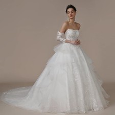 Customized Strapless A Line Glitter Wedding Dress For Bride Sweep Train Ruffles