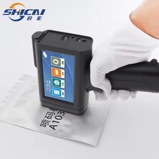 Handheld inkjet printer prints date text, barcode code, batch number image