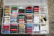 Plastic Embroidery Floss Box with 86 Skeins of Yarn on Plastic Bobbins