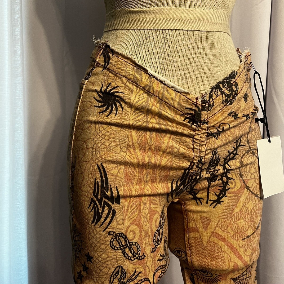 Urban Outfitters BDG Ruched Dipped V-Front Flare Printed Jeans