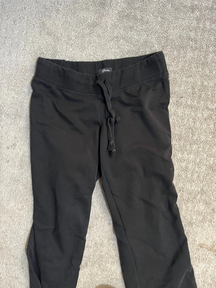 Pantalones deportivos para mujer Guess negros talla mediana con logotipo cordón Foto 2 de 4