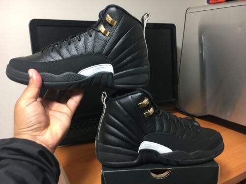 black and gold jordan's 12