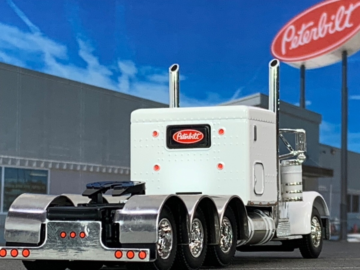 1/64 DCP WHITE PETERBILT 379 TRI AXLE W/ 63